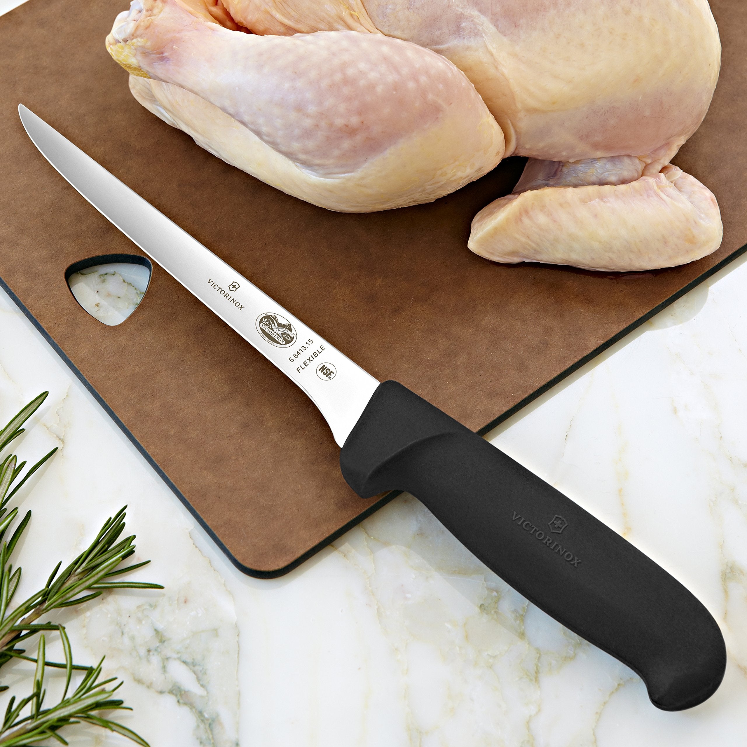 Victorinox slicing knife carving roast to show precise, even cuts for serving benefit
