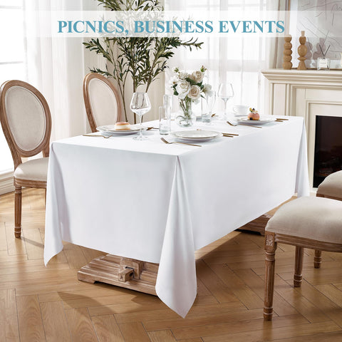 VidaFete tablecloth with dinnerware showing fit and scale for tables