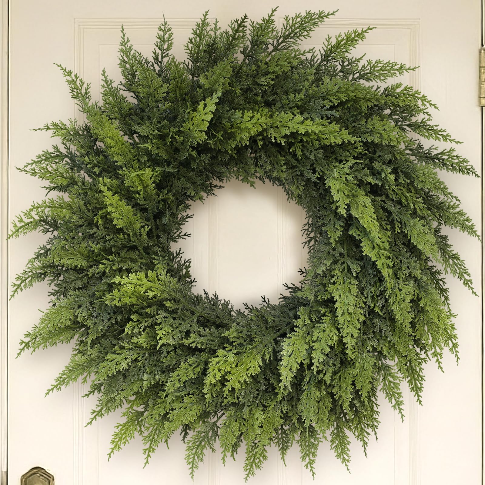 VIERENA front door view showing full 24-inch cedar wreath for instant curb appeal