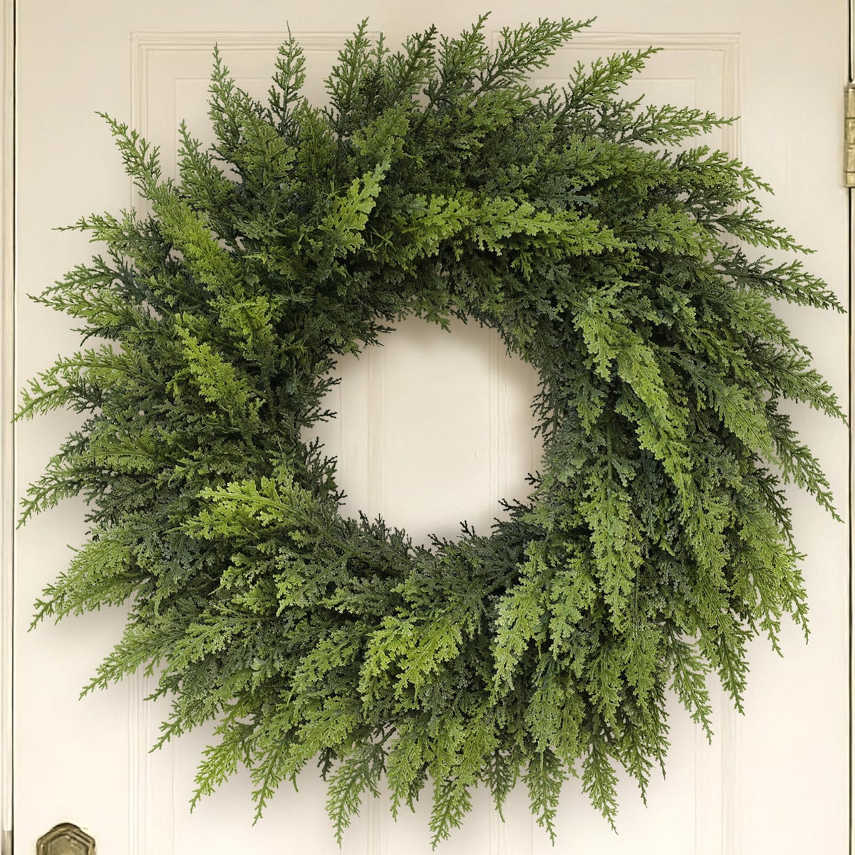 VIERENA front door view showing full 24-inch cedar wreath for instant curb appeal