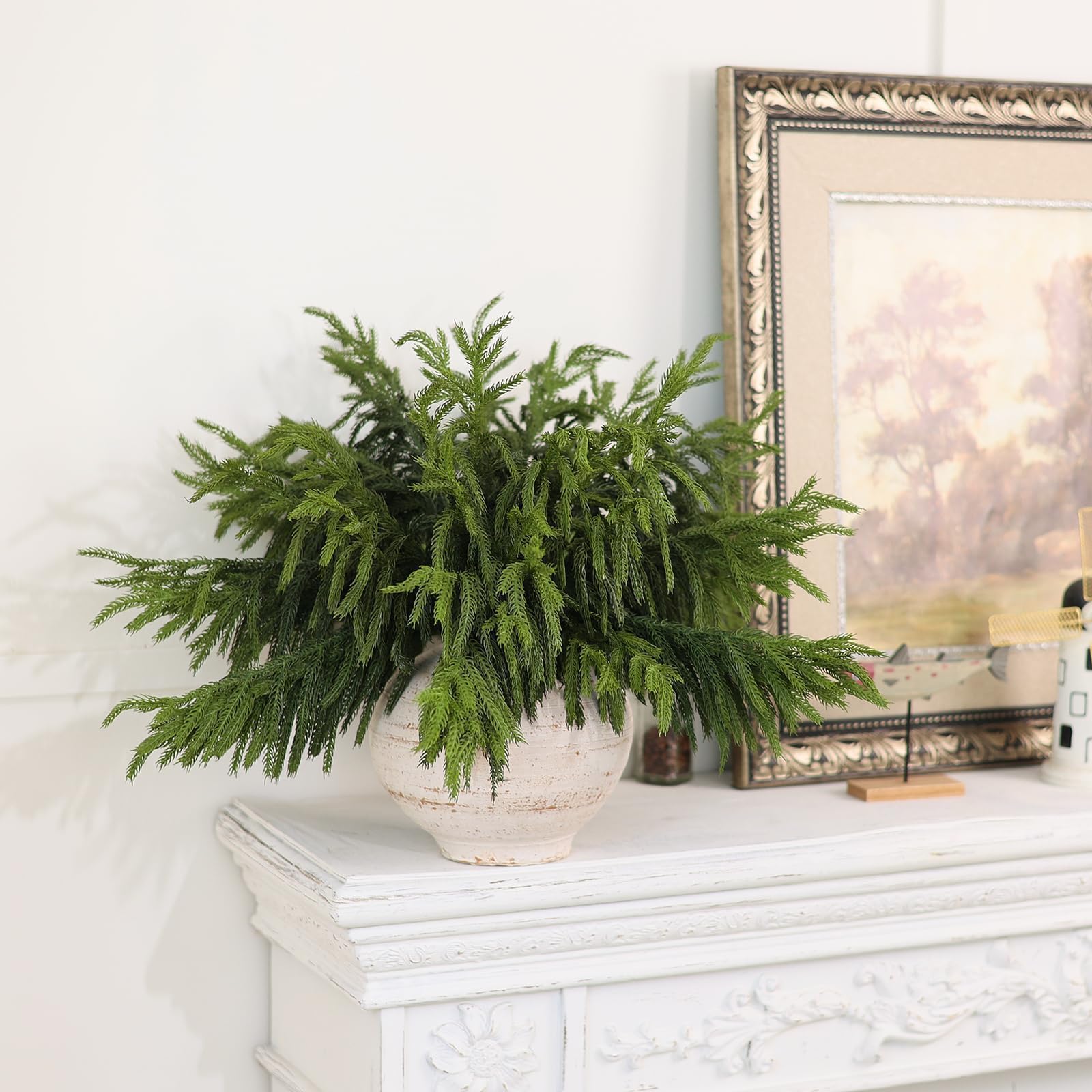 VIERENA branches styled in a vase adding instant seasonal greenery
