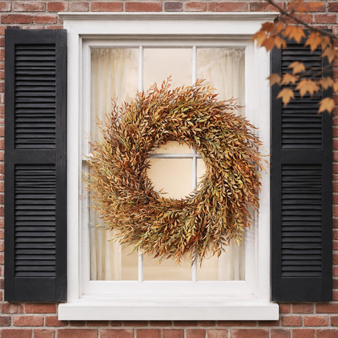 VIERENA wreath displayed on mantel creating cozy autumn ambiance