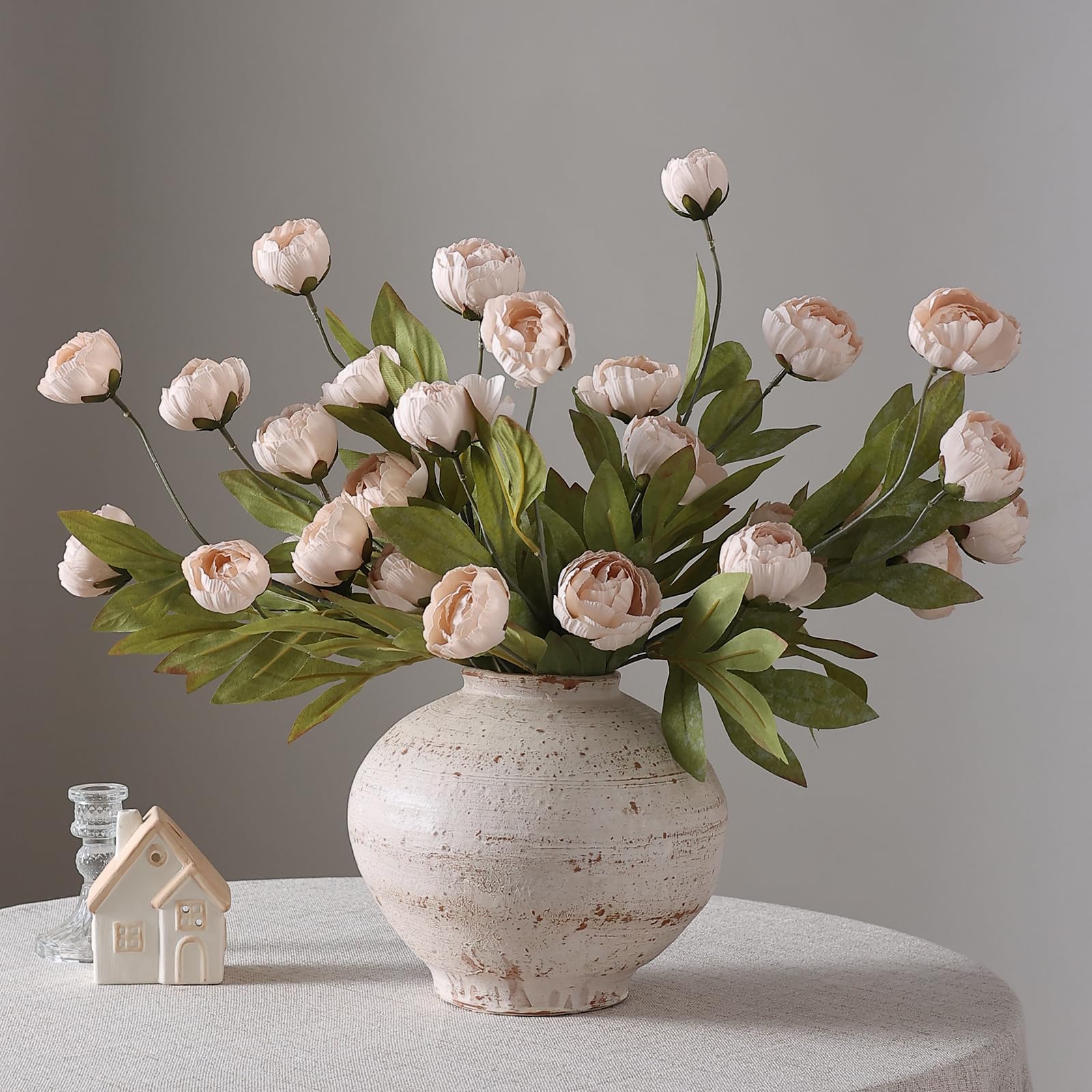 VIERENA packaged peony stems laid on table, highlights ready-to-use convenience