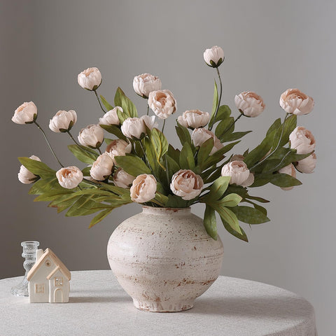 VIERENA packaged peony stems laid on table, highlights ready-to-use convenience