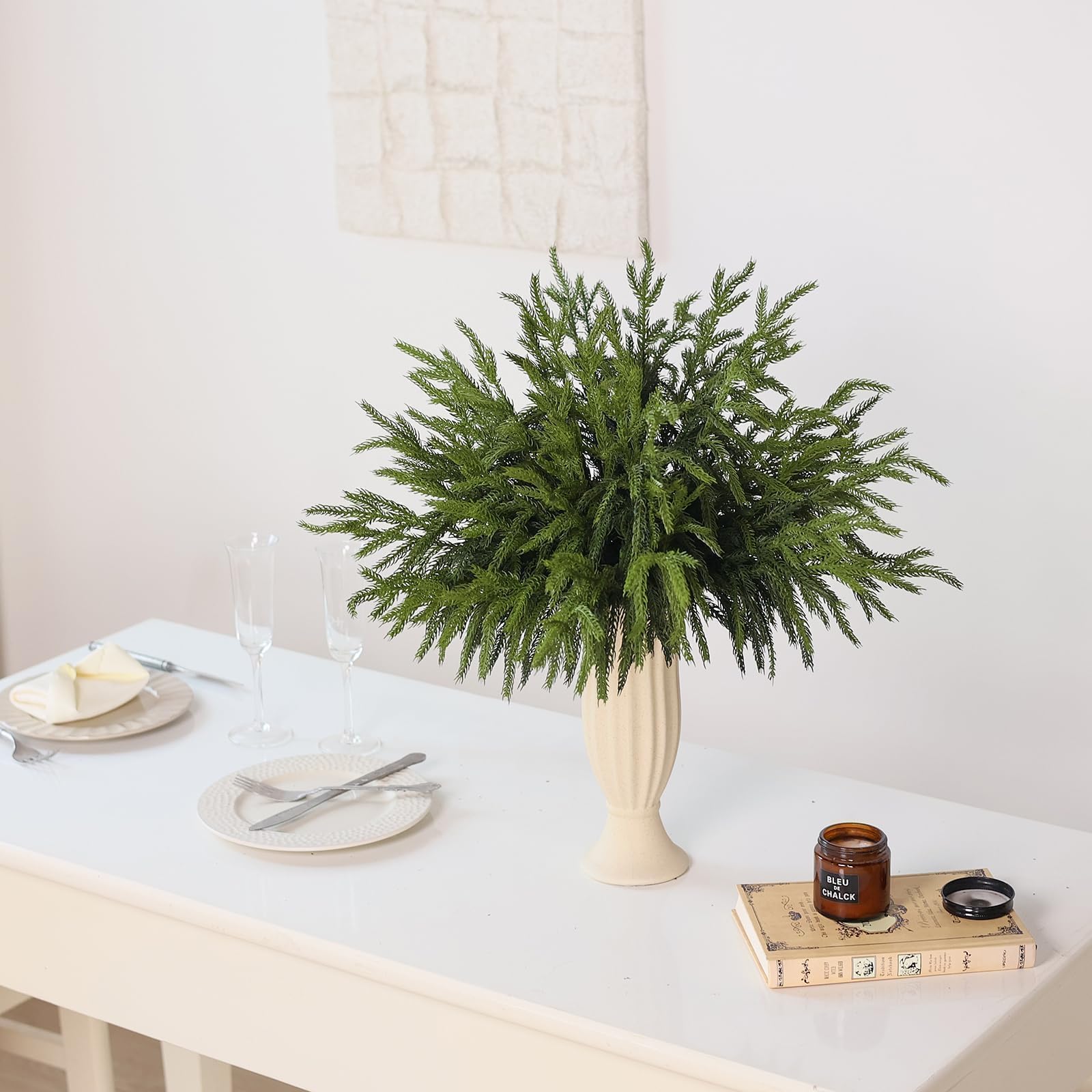 VIERENA centerpiece with branches creating a low-maintenance tablescape