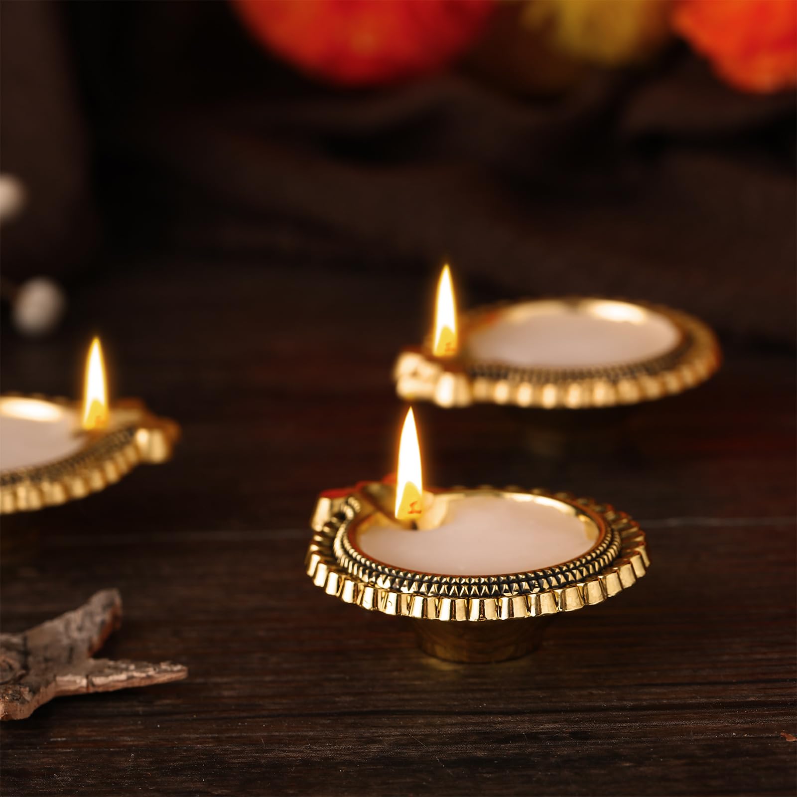 VIHOSE row of lit diyas on rangoli showing cohesive glow and decorative impact