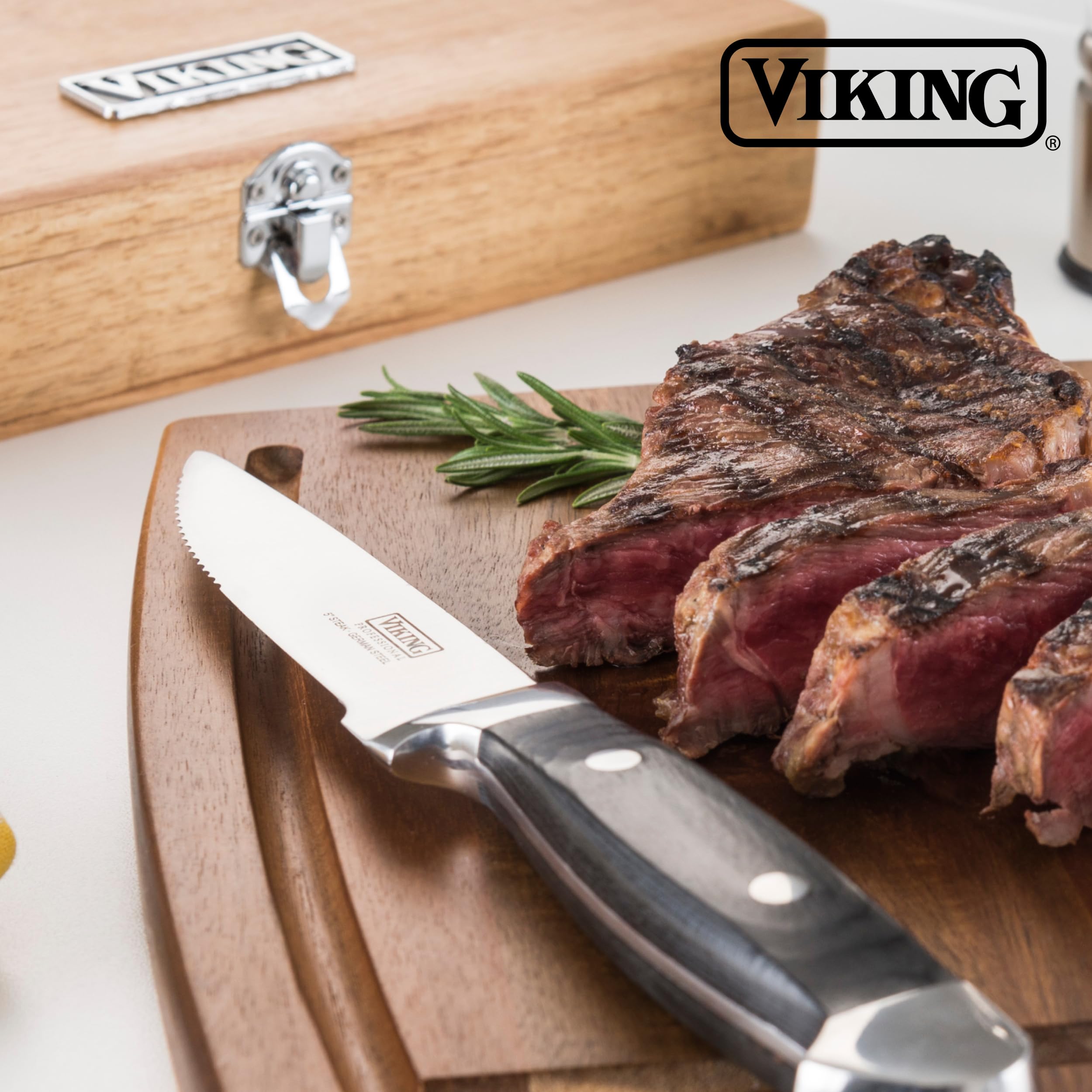 Viking knife held in hand for size comparison and comfortable control