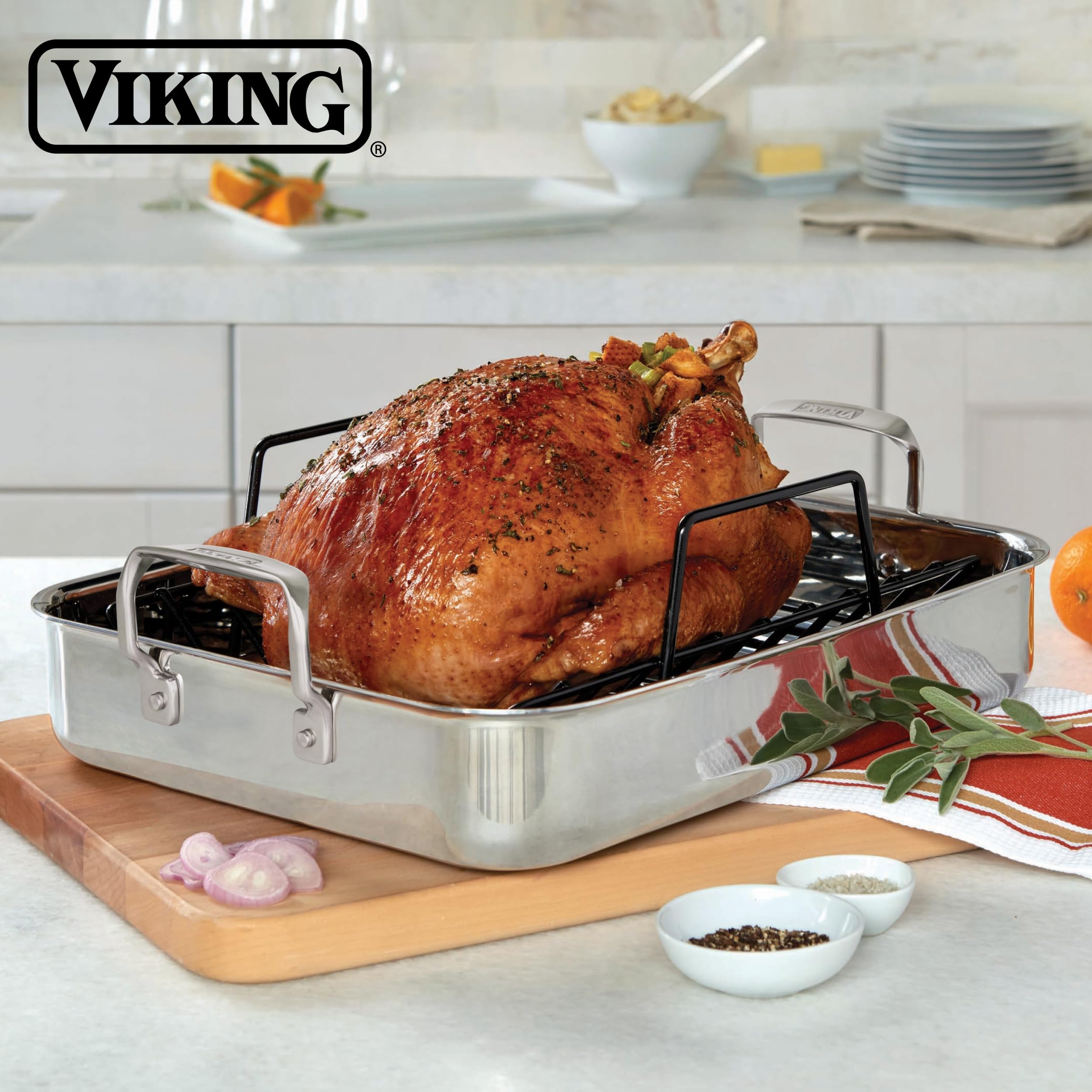 Viking pan next to measuring tape for size comparison and fit assurance in home ovens