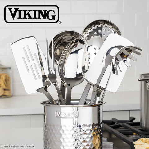 Viking utensils next to a spoon and pan to show scale and practical kitchen fit