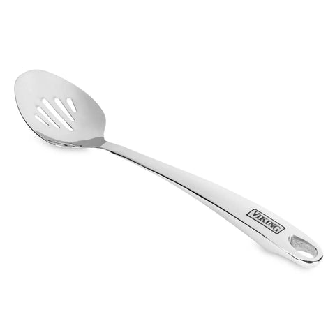Viking spatula in use flipping food in a skillet for precise, reliable control