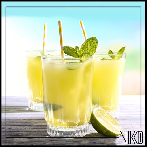 Vikko glass held beside a hand to show scale and convenient portion control.