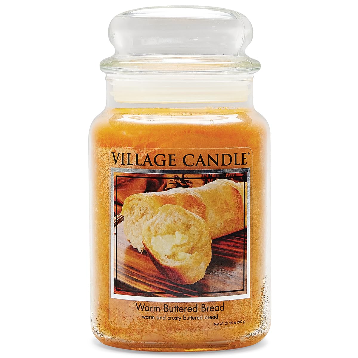 Village Candle front packaging showing apothecary jar and warm brown glass benefit: decorative warmth