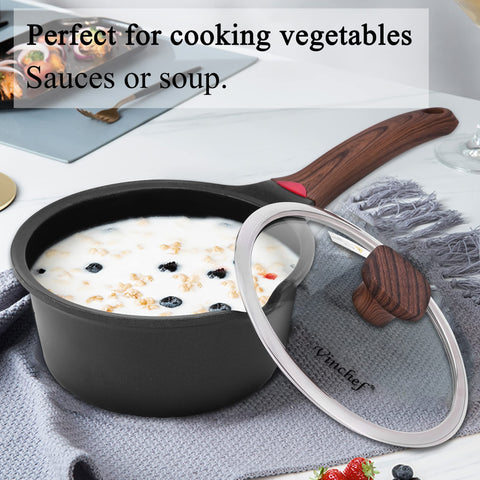 Vinchef Bakelite handle detail demonstrating cool-touch grip for safe stirring and pouring