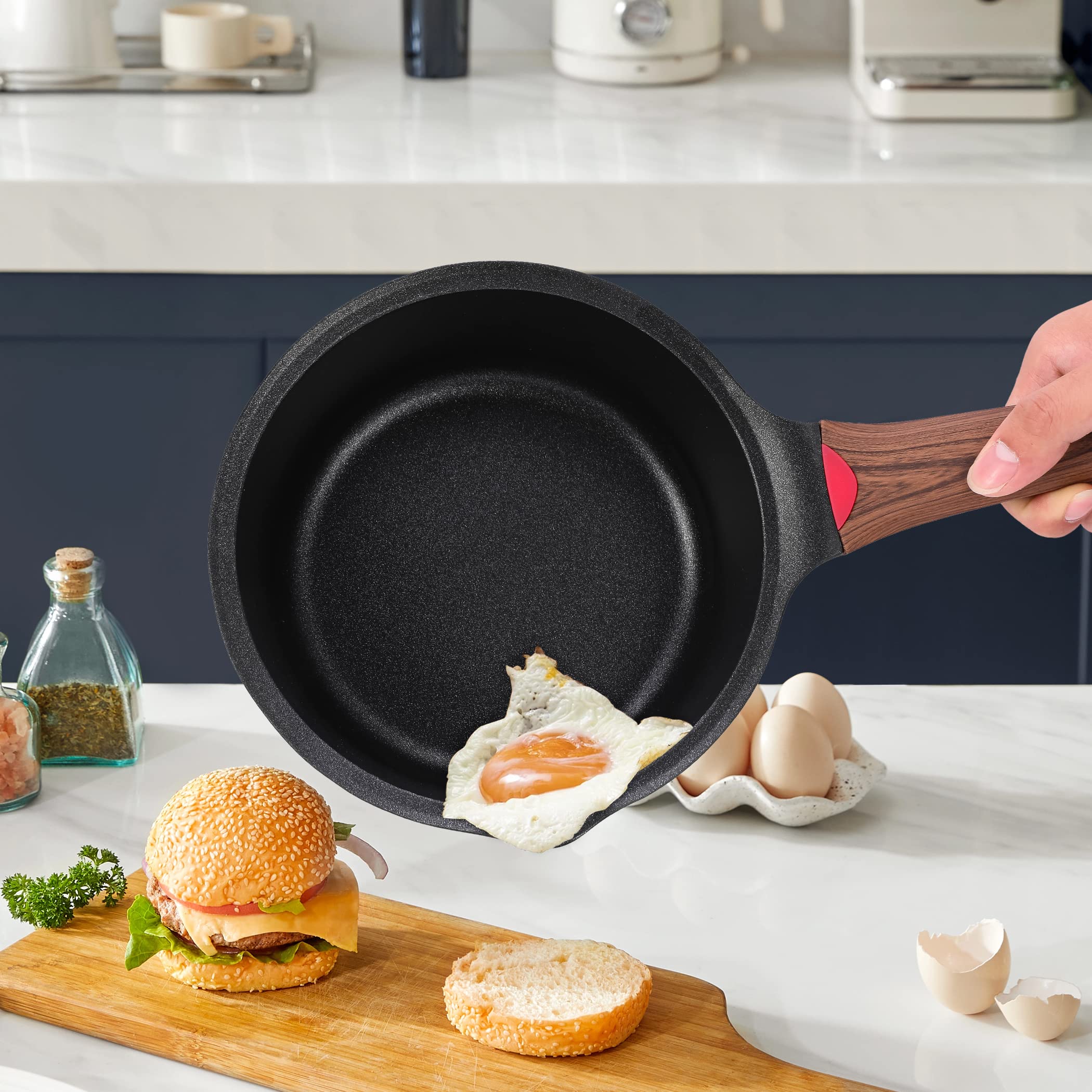 Vinchef saucepan on stovetop simmering sauce, highlighting even heat distribution benefit
