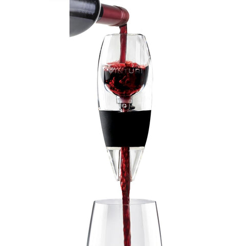 Vinturi aerator beside wine bottle showing size and countertop fit