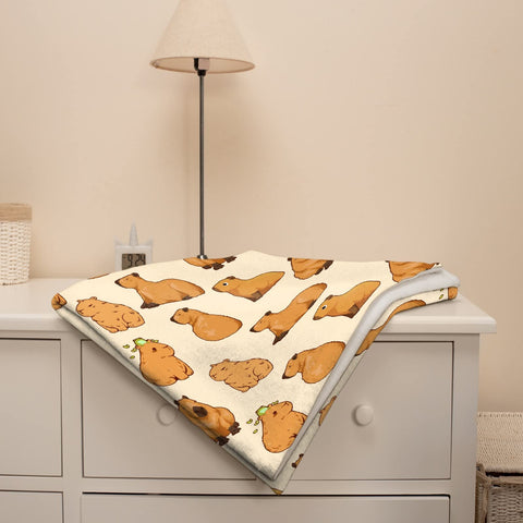 Virudhaka capybaras blanket styled in bedroom creating playful, inviting atmosphere