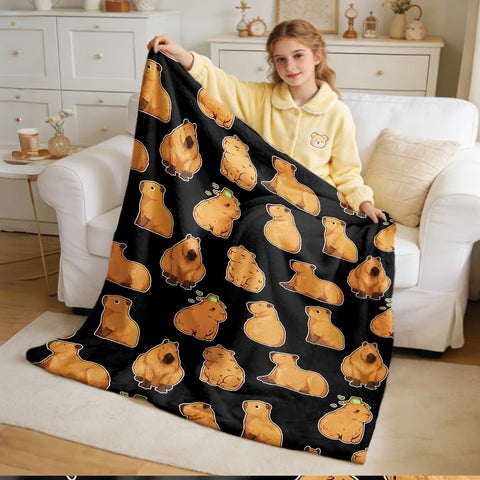 Virudhaka blanket beside a ruler for 40x50 size comparison and portability benefit