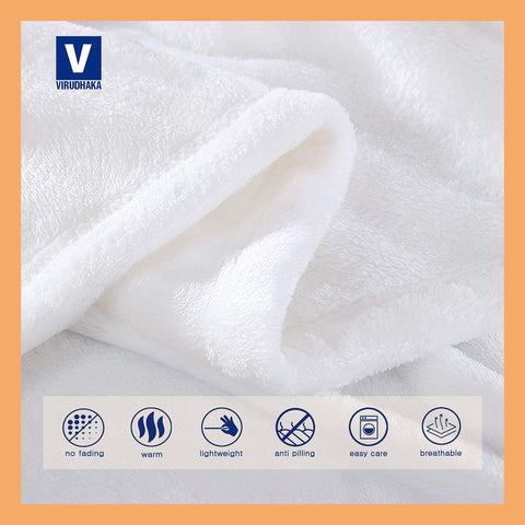 Virudhaka blanket styled on bed adding playful fox decor and protection