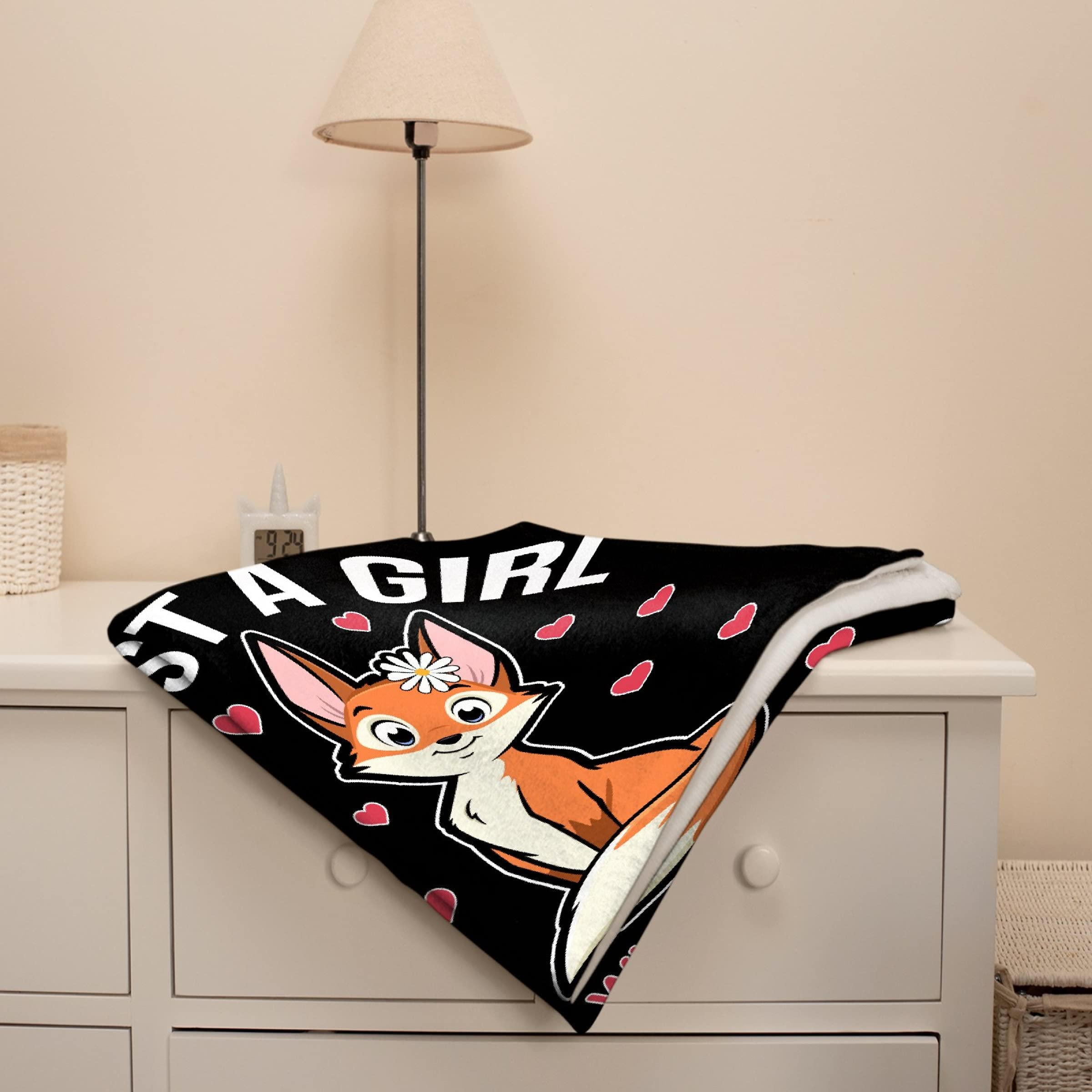 Virudhaka blanket beside ruler for 40x50 inch size scale and fit
