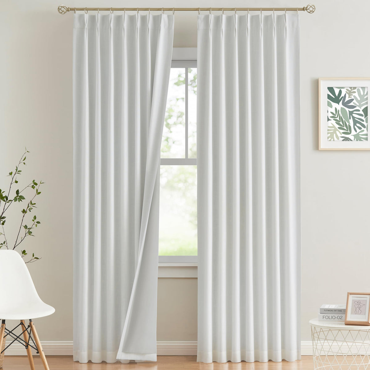 Vision Home front view of two white pinch pleat panels showing tailored look and benefit