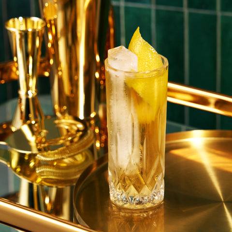 Viski glass with cocktail and garnish illustrating presentation and color contrast