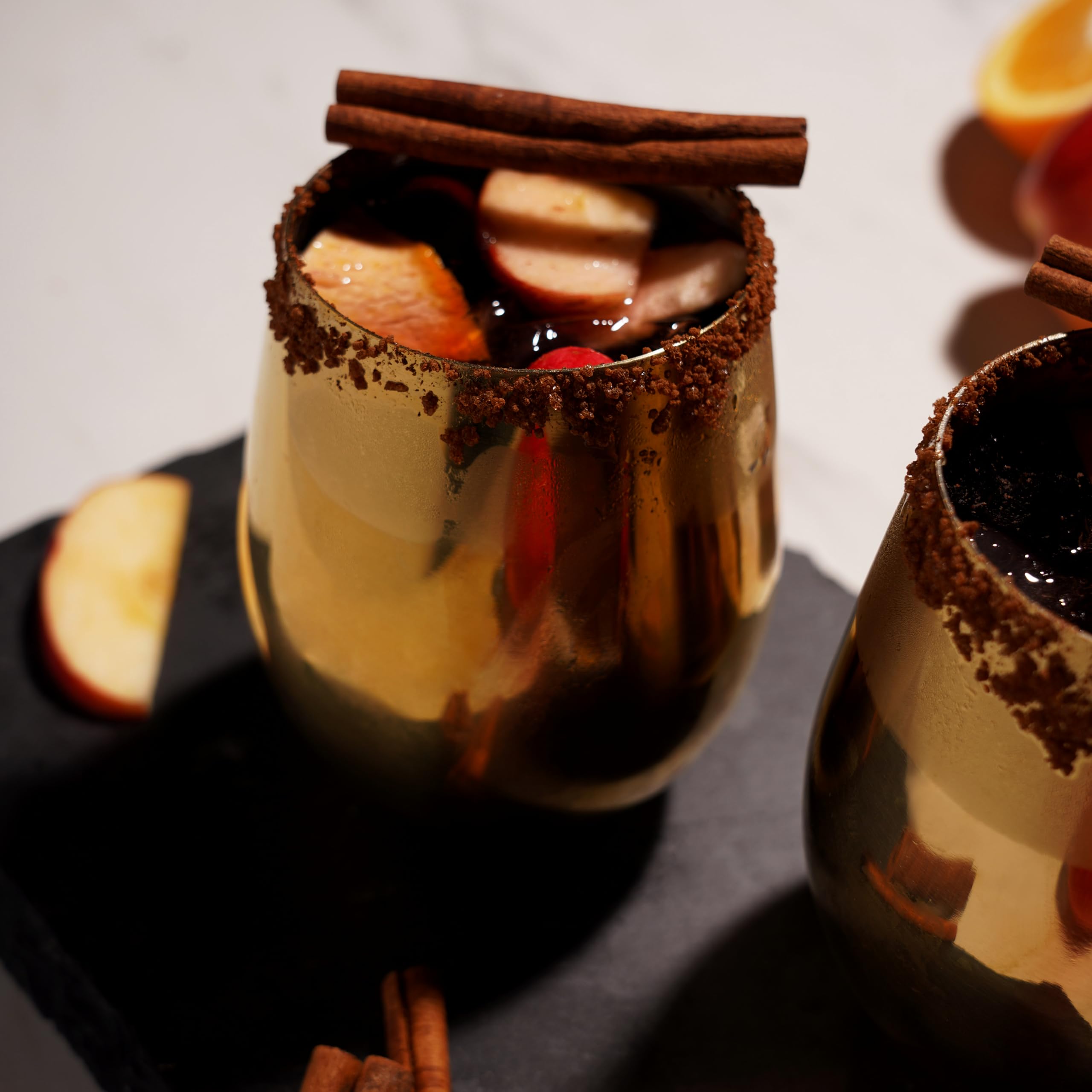 Viski tumblers held in hand showing scale and comfortable grip for serving