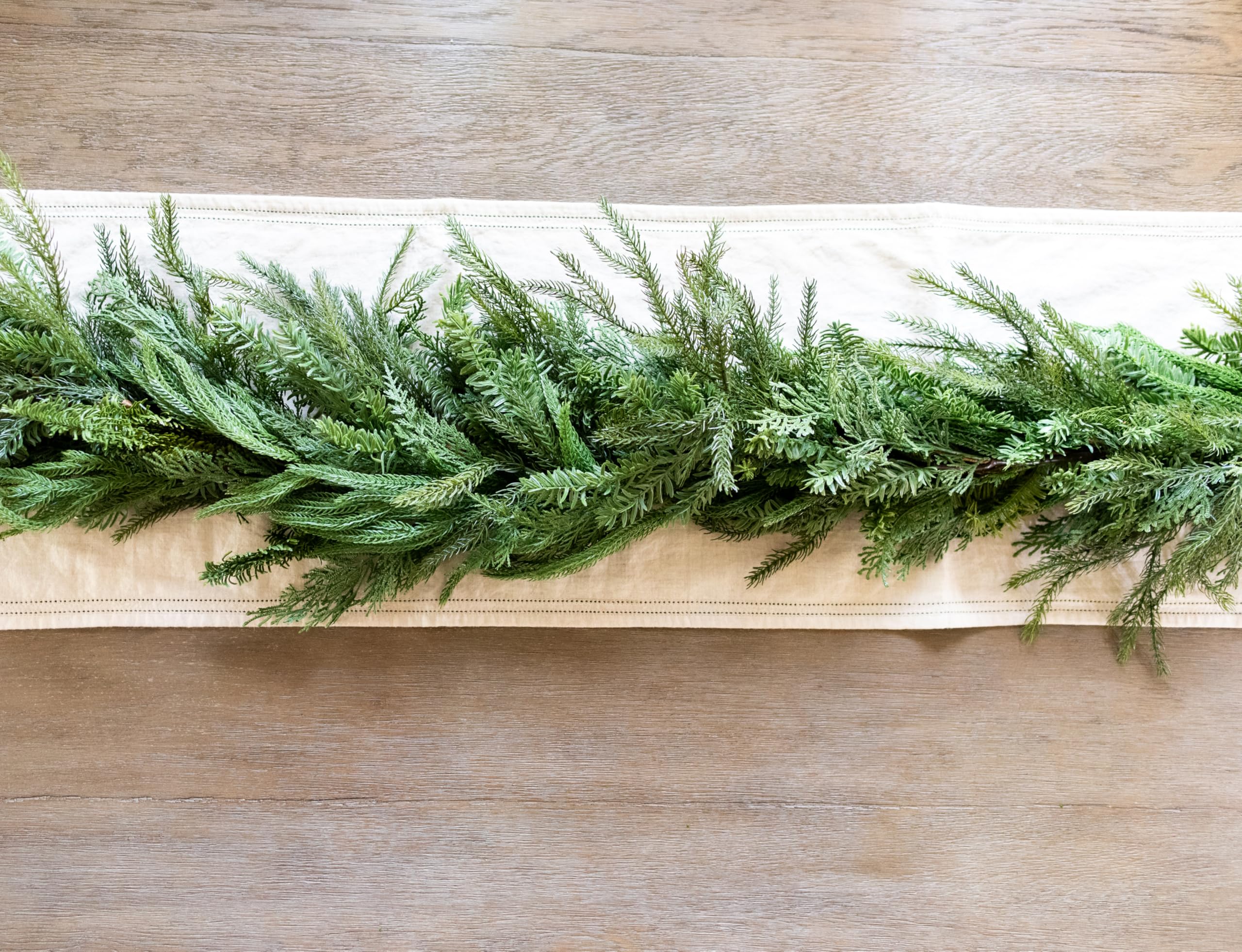 Vita Domi cedar sprig detail highlighting texture and natural depth