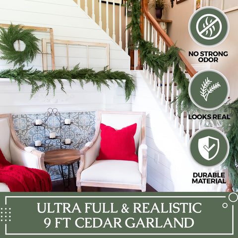 Vita Domi cedar garland wrapped along staircase railing for elegant holiday décor