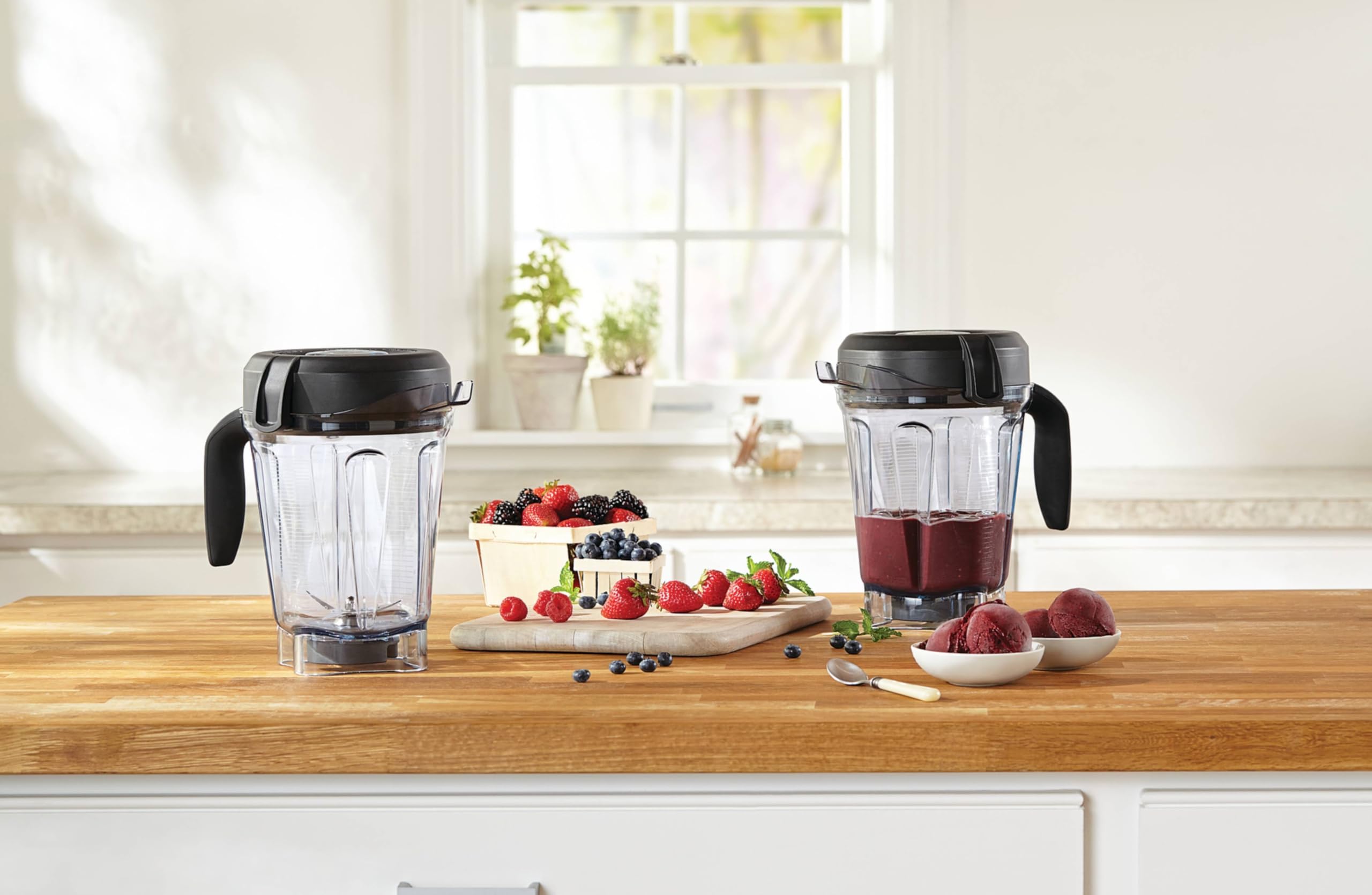 Vitamix soft-grip handle pouring smoothie with steady control benefit