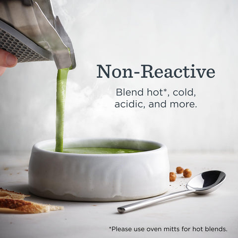 Vitamix container in use blending hot soup showcasing non-reactive stainless-steel benefit