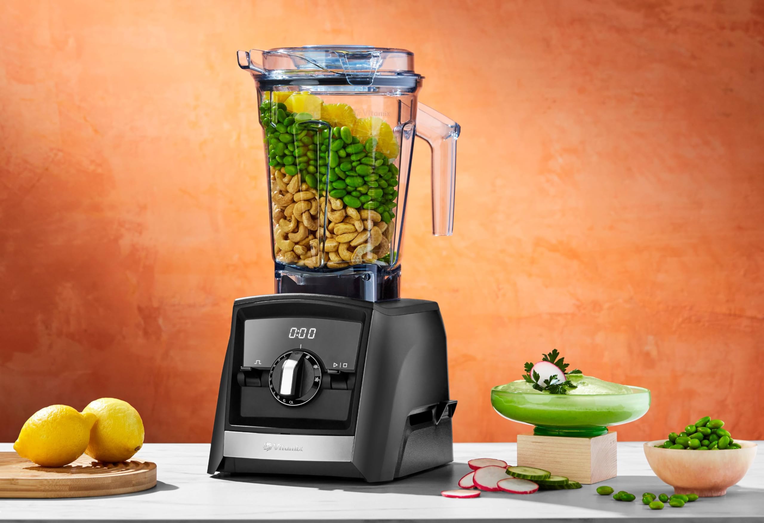 Vitamix clear lid with removable vented plug showing convenient monitoring and adding