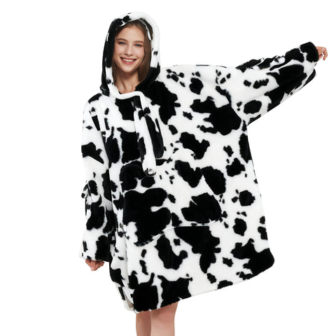 Viviland front view cow-print hoodie showing full oversized coverage and cozy look