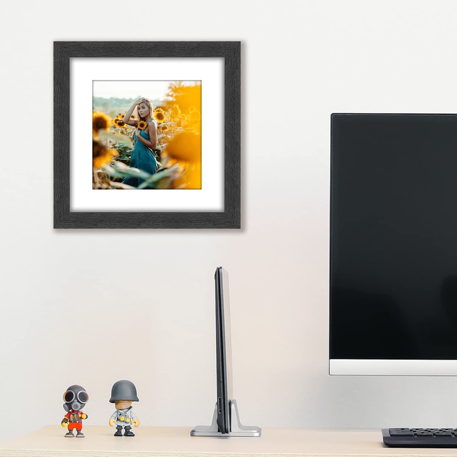 VMUZEDER frame held in hand for scale showing compact, lightweight design