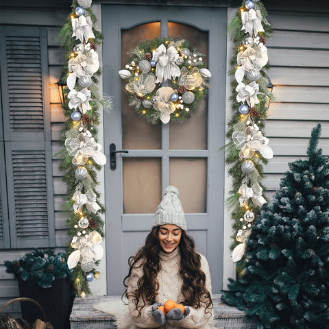 Vofuly wreath lit on porch creating warm evening ambiance