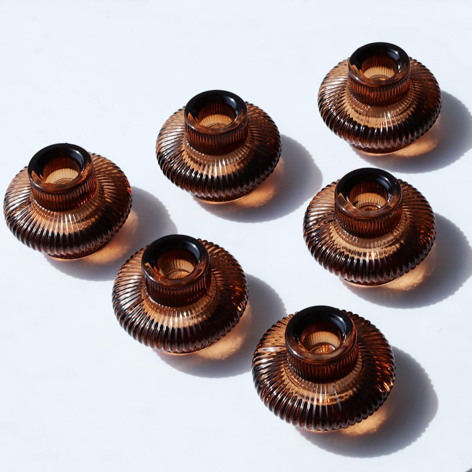 VOHO front view of six amber candlestick holders showing warm tone benefit