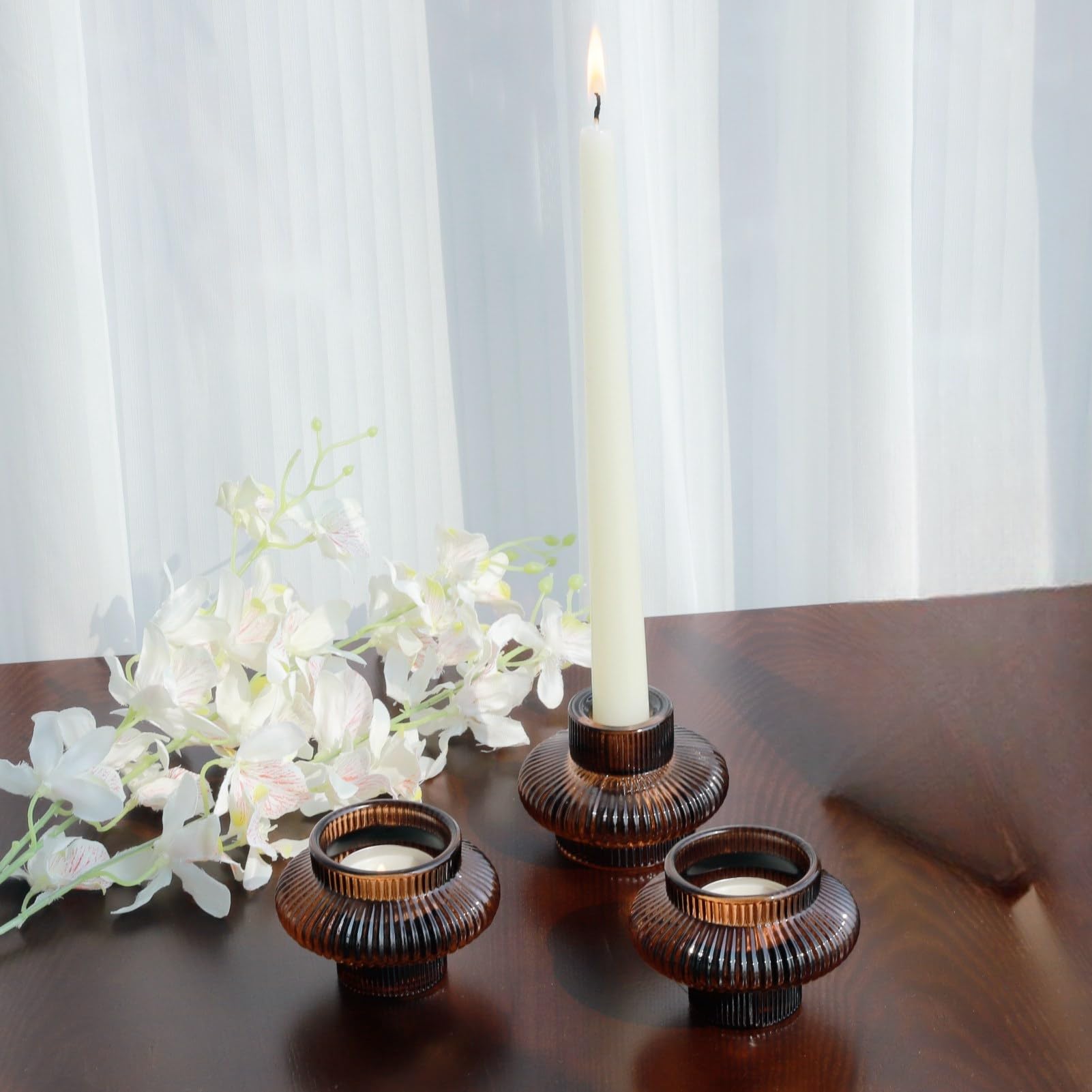 VOHO styled table with holders showing cozy centerpiece and ambiance