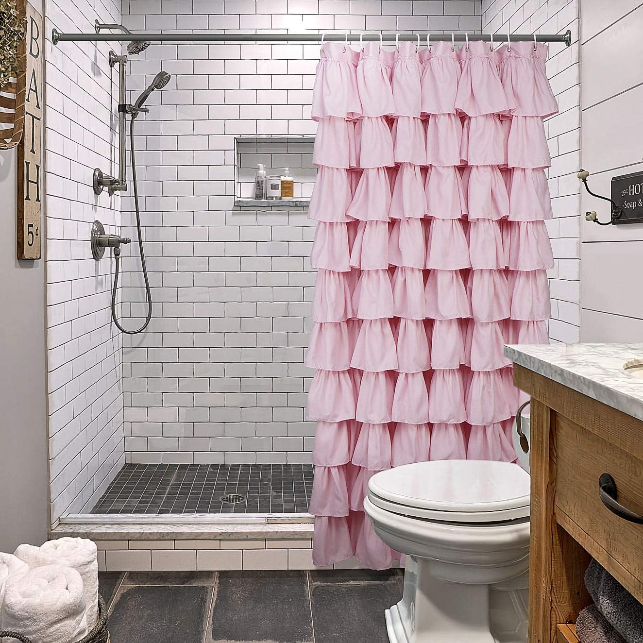 Volens curtain installed in bathroom creating warm, brightened shower area