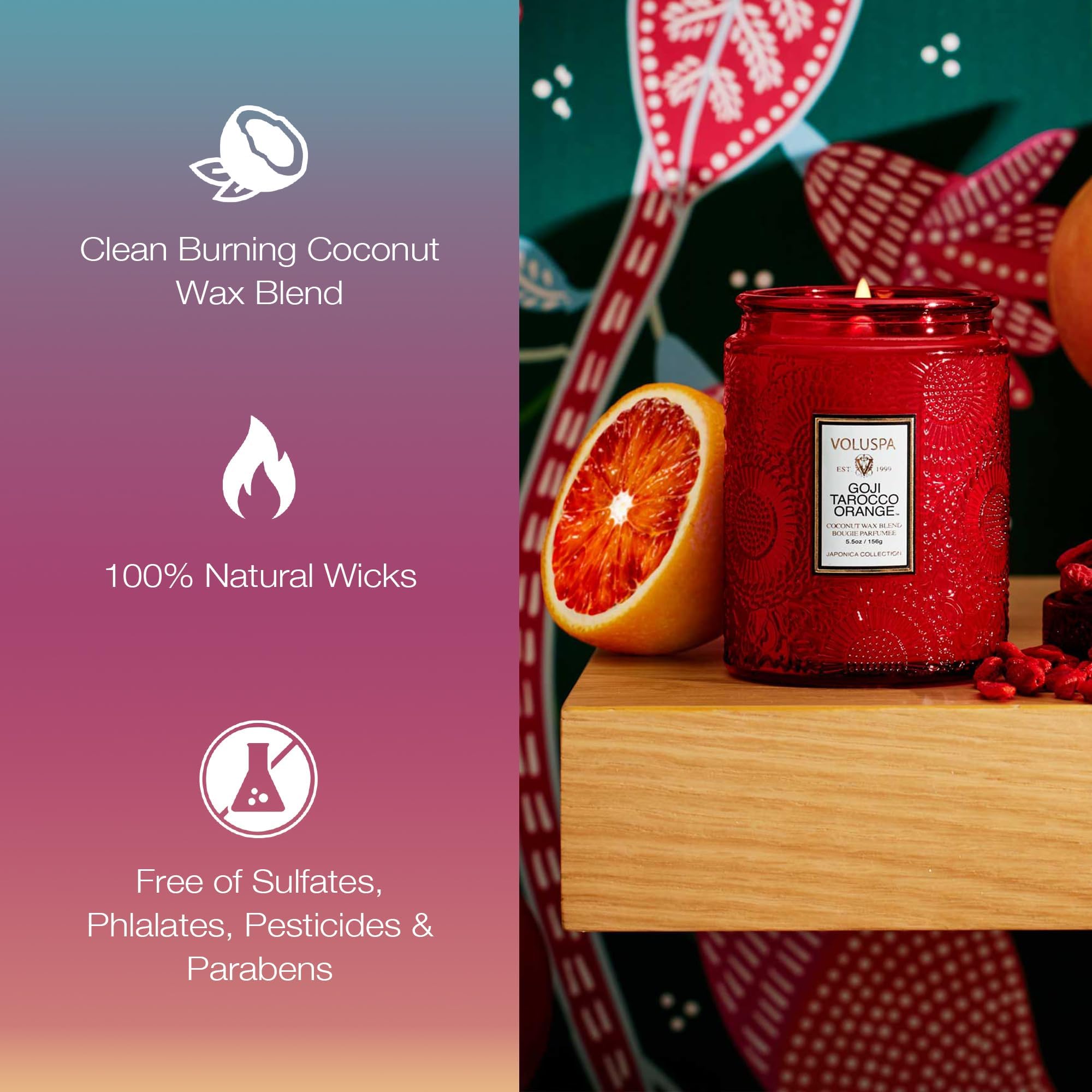 Voluspa candle lit on bathroom shelf creating ambient citrus-fruit warmth
