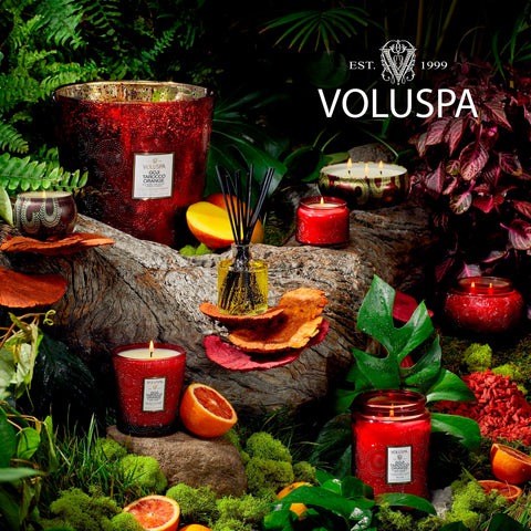 Gift-ready Voluspa packaging displayed with ribbon for thoughtful presentation