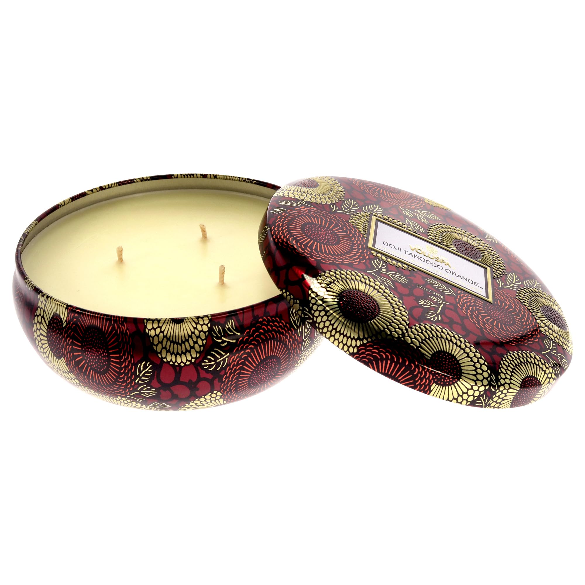 Voluspa candle on a coffee table setting, creates inviting home atmosphere