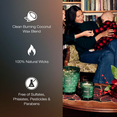 Voluspa candle lit in living room creates cozy holiday ambiance and soft glow