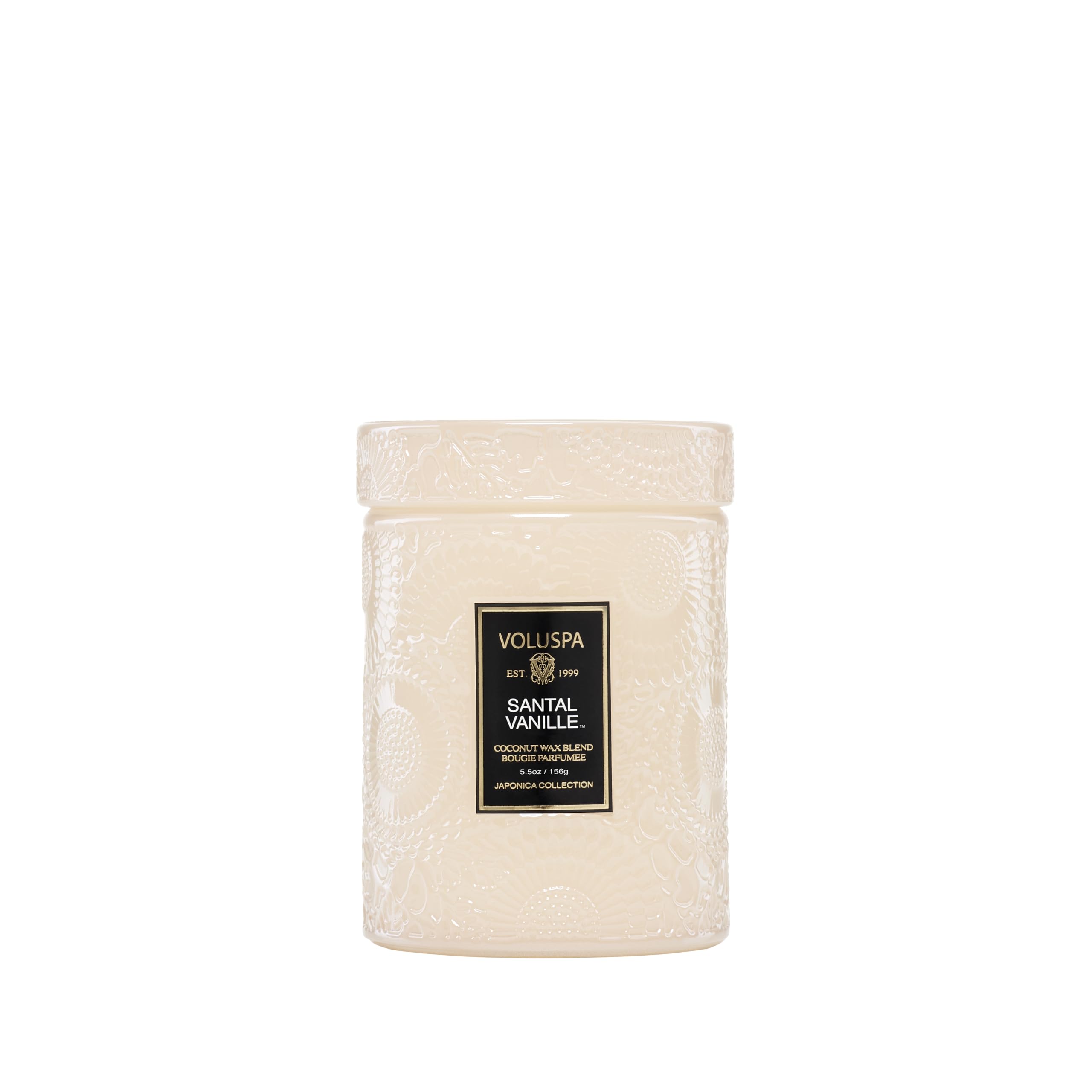 Voluspa Santal Vanille front jar showing white glass and candle glow benefit: elegant décor