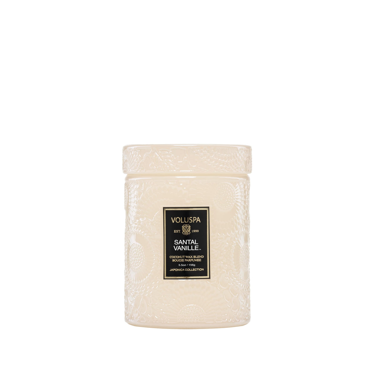 Voluspa Santal Vanille front jar showing white glass and candle glow benefit: elegant décor