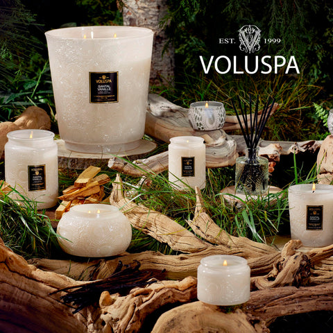 Voluspa candle in a styled living area benefit: gift-ready lifestyle accent