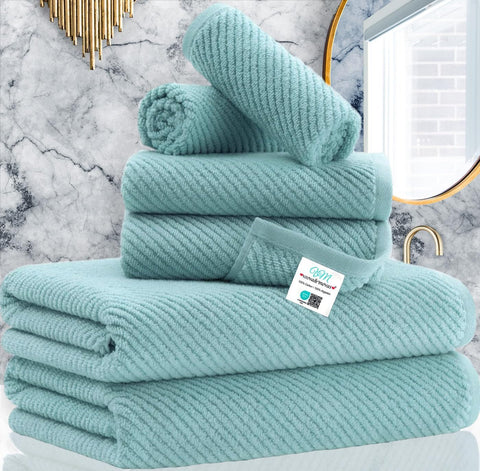 VOOVA & MOVAS folded towel set front view showing aqua teal and neat stack, ideal for decor