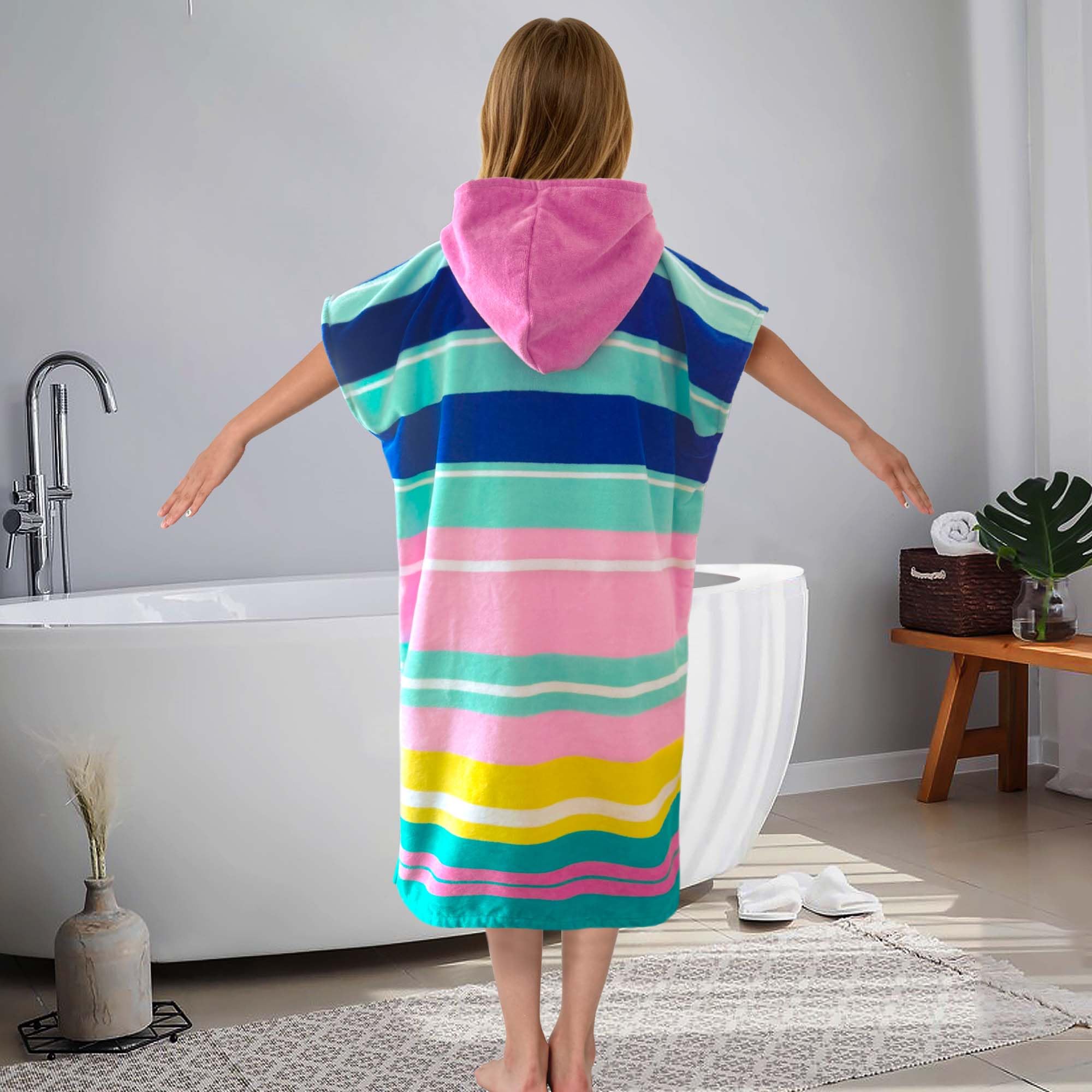 VOOVA & MOVAS teen wearing towel poolside illustrating privacy and quick drying benefit