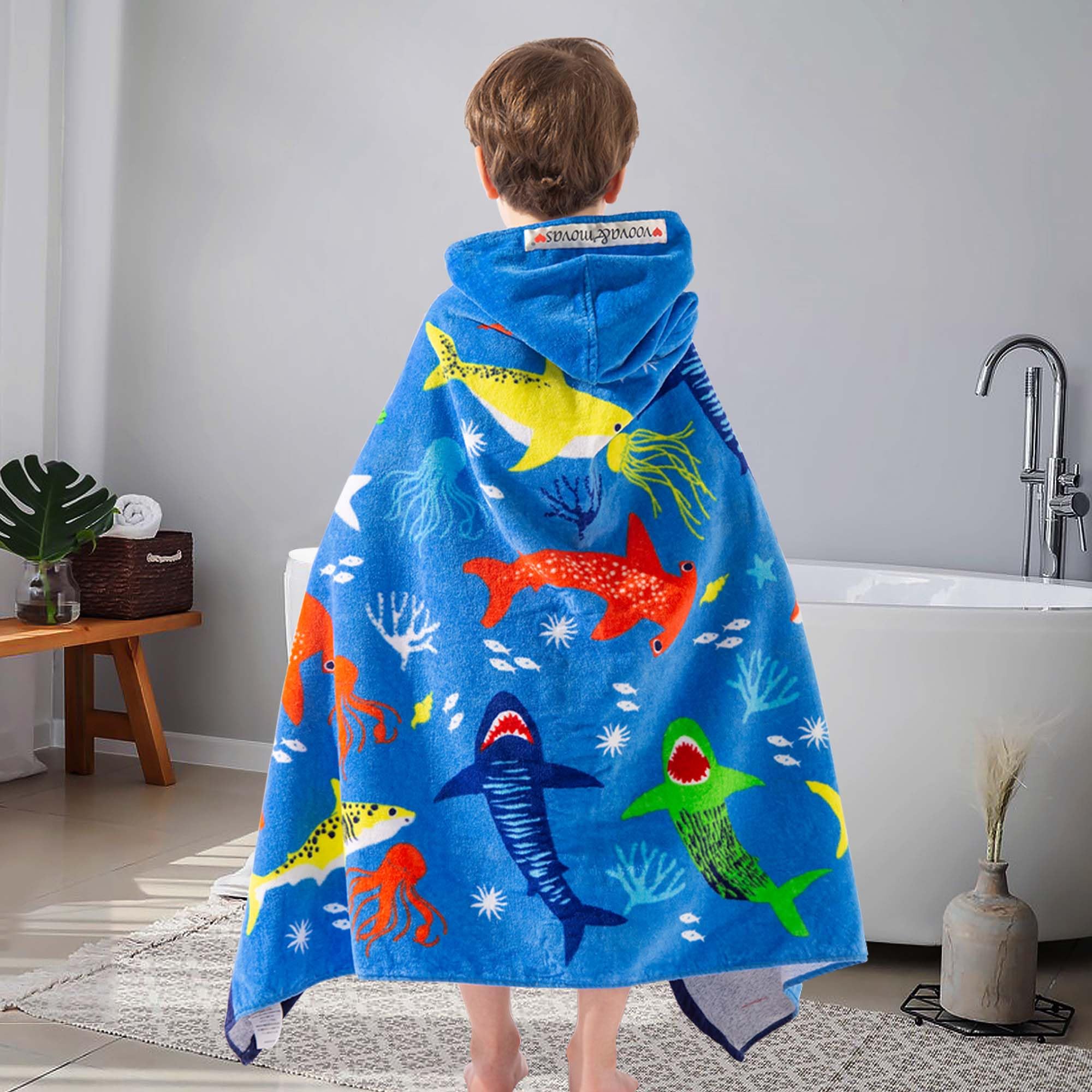 VOOVA & MOVAS towel beside ruler showing 50×30 size for ages 3–8