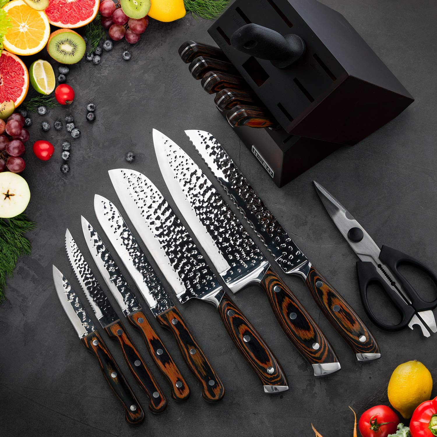 Vvwgkpk chef knife held in hand for scale, balanced ergonomic handling benefit