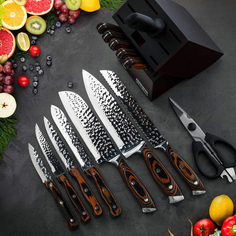 Vvwgkpk chef knife held in hand for scale, balanced ergonomic handling benefit
