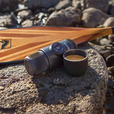 WACACO Nanopresso being used outdoors producing espresso on the go for café-quality flavor